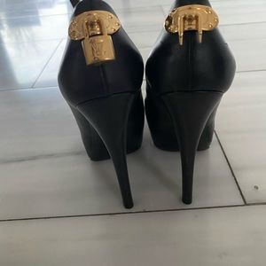 Authentic Louis Vuitton black leather pumps